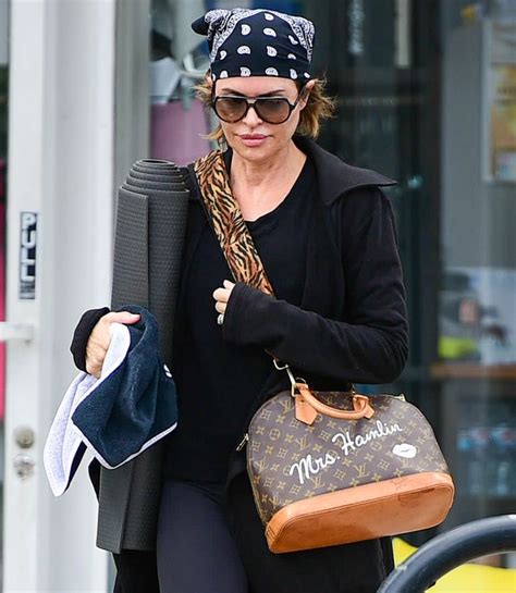 Lisa Rinna Shows Off Custom Louis Vuitton 'Mrs. Hamlin' Purse